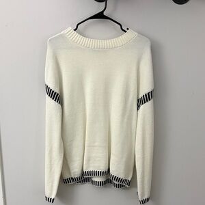 Elegant White Sweater with Black Accents